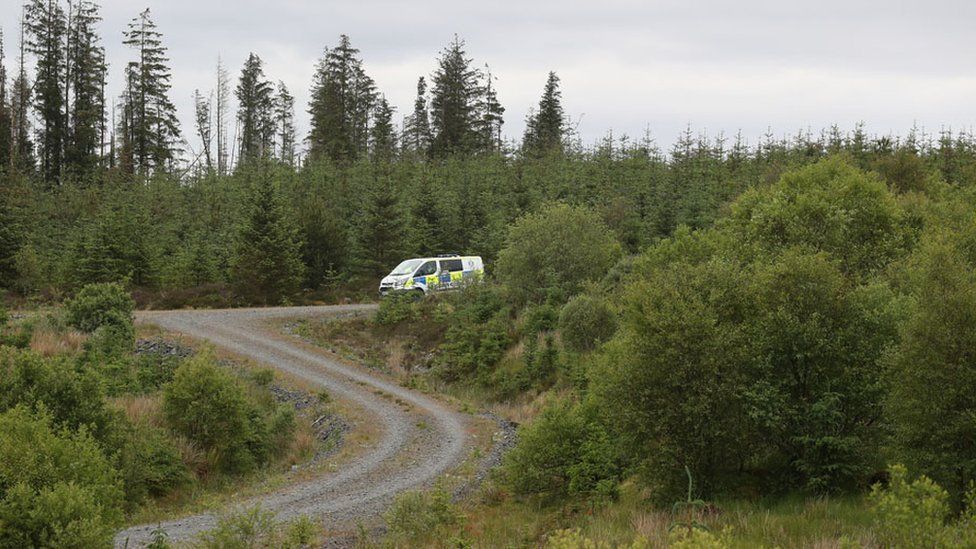 Police at the scene where the body was found