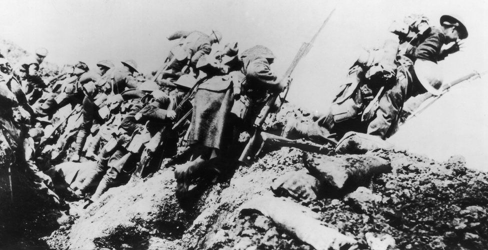 British troops climbing from their trench on the first day of 'The Big Push' on the Somme
