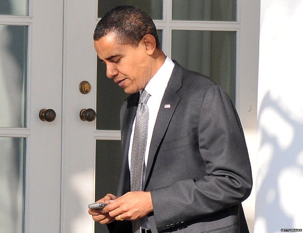 Barack Obama with a Blackberry in 2009