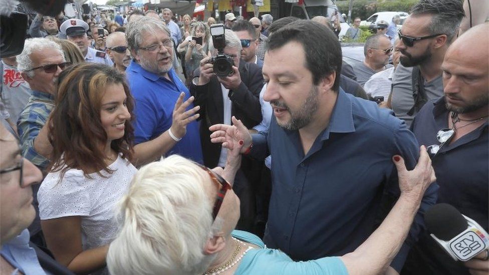 The leader of Italy's League party, Matteo Salvini, greets supporters in Pisa, 30 May 2018