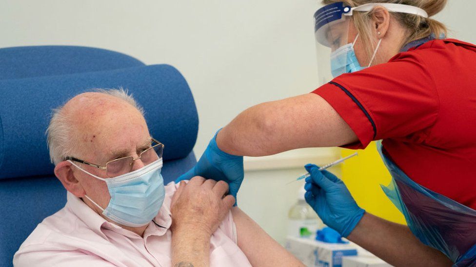 man-being-given-vaccine.