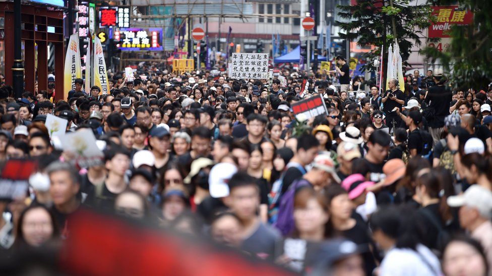 Protesters gather to attend a new rally against a controversial extradition law proposal in Hong Kong on June 16, 2019