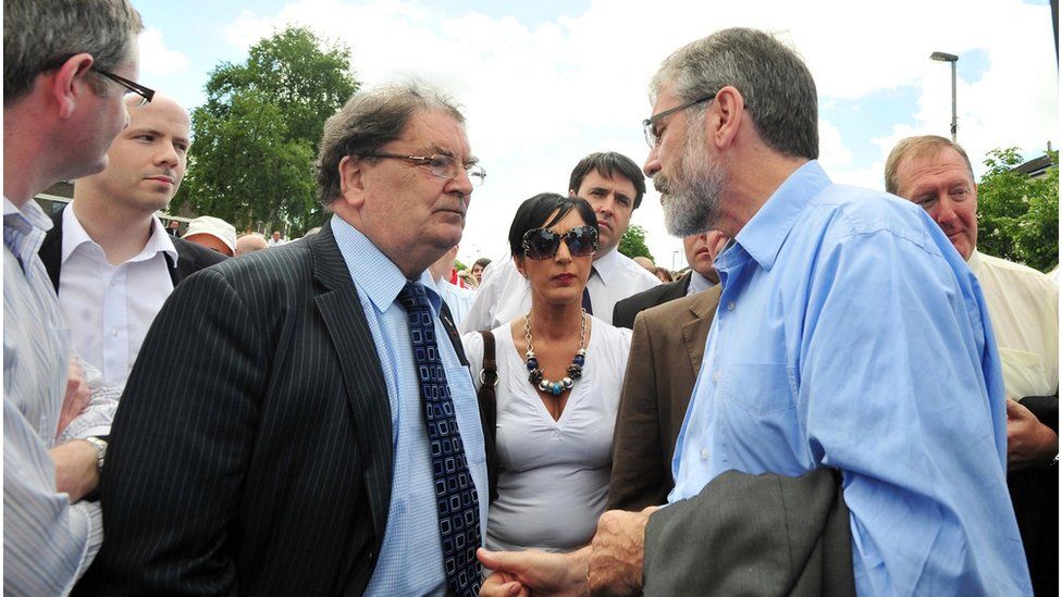 John Hume with Gerry Adams during a march in Derry before the release of the findings of the Saville Inquiry into Bloody Sunday