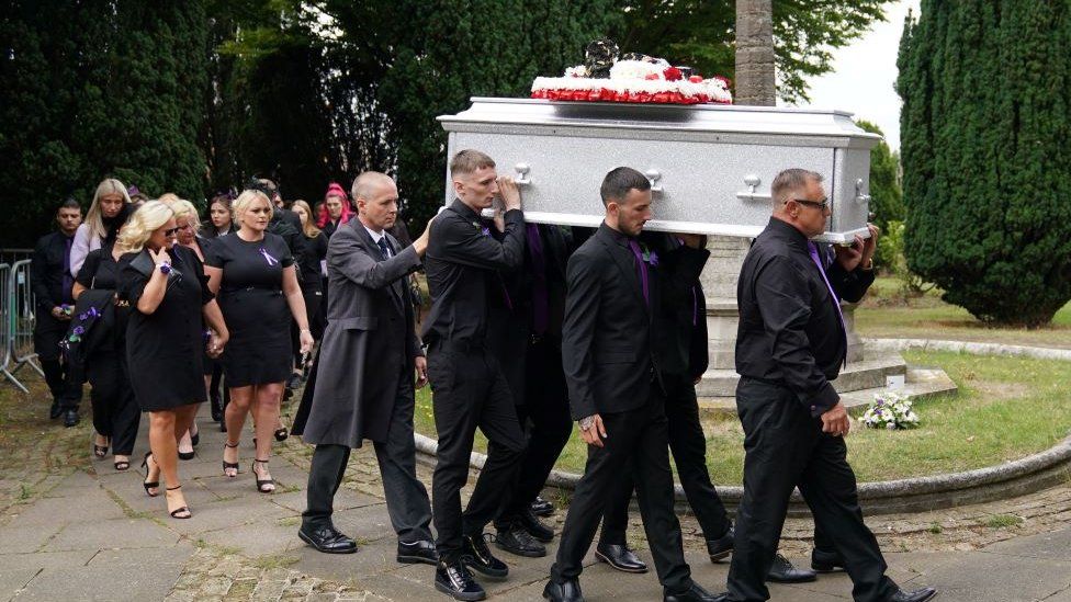 Archie Battersbee's coffin was carried into the church, followed by members of his family