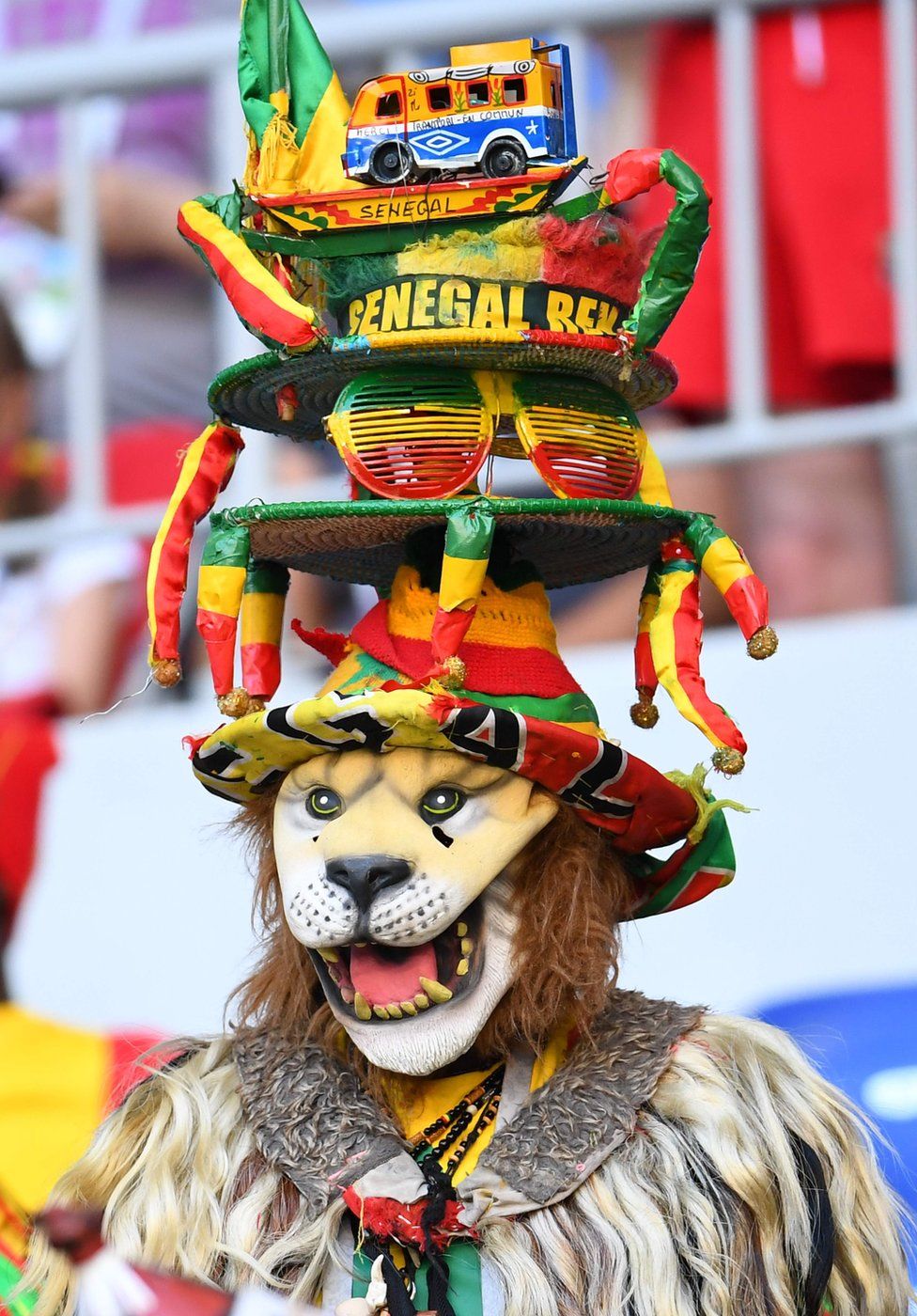A Senegal fan cheers prior to the Russia 2018 World Cup Group H football match between Senegal and Colombia at the Samara Arena in Samara on June 28, 2018.
