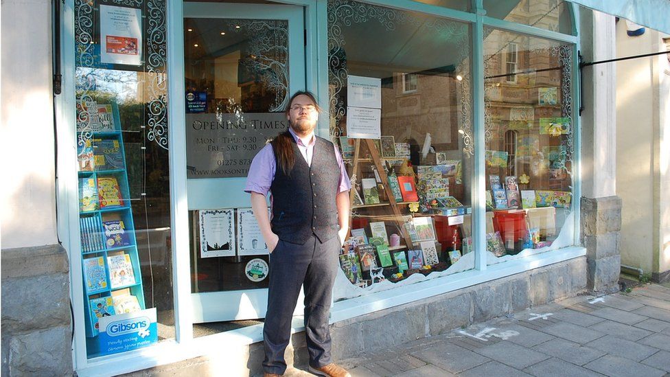 Dr Sims outside his shop Books on the Hill