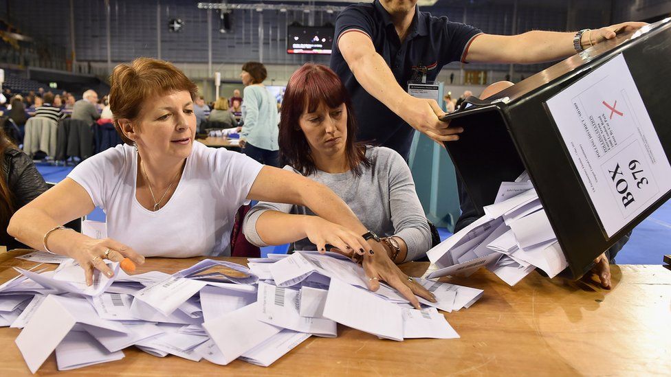 Ballot papers are counted at the Glasgow count for the UK parliamentary elections in 2015