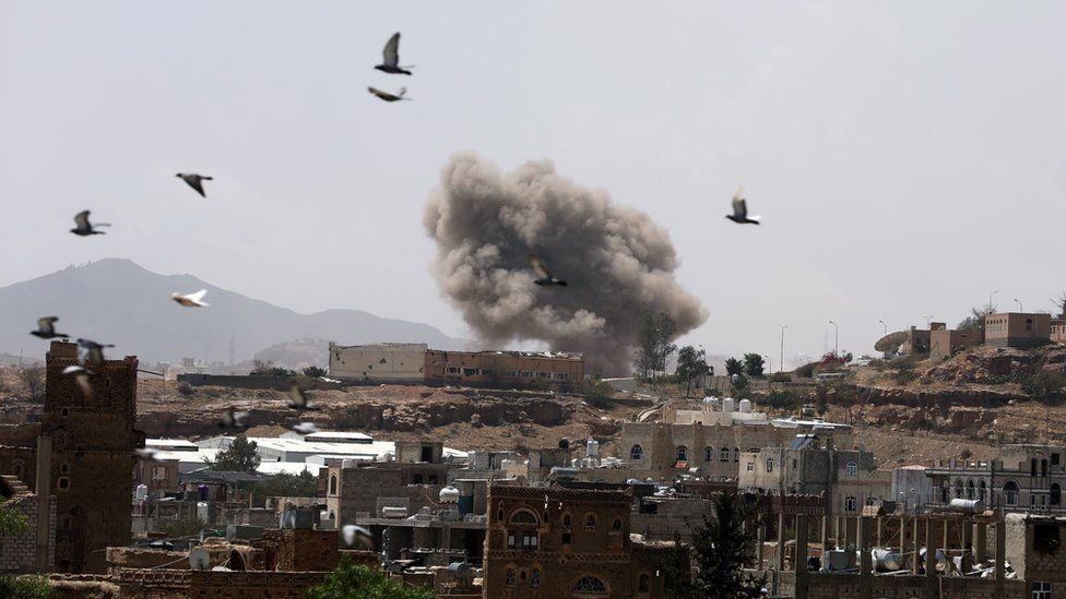 Smoke rises from Sanaa, Yemen, after a reported air strike (30 March 2020)