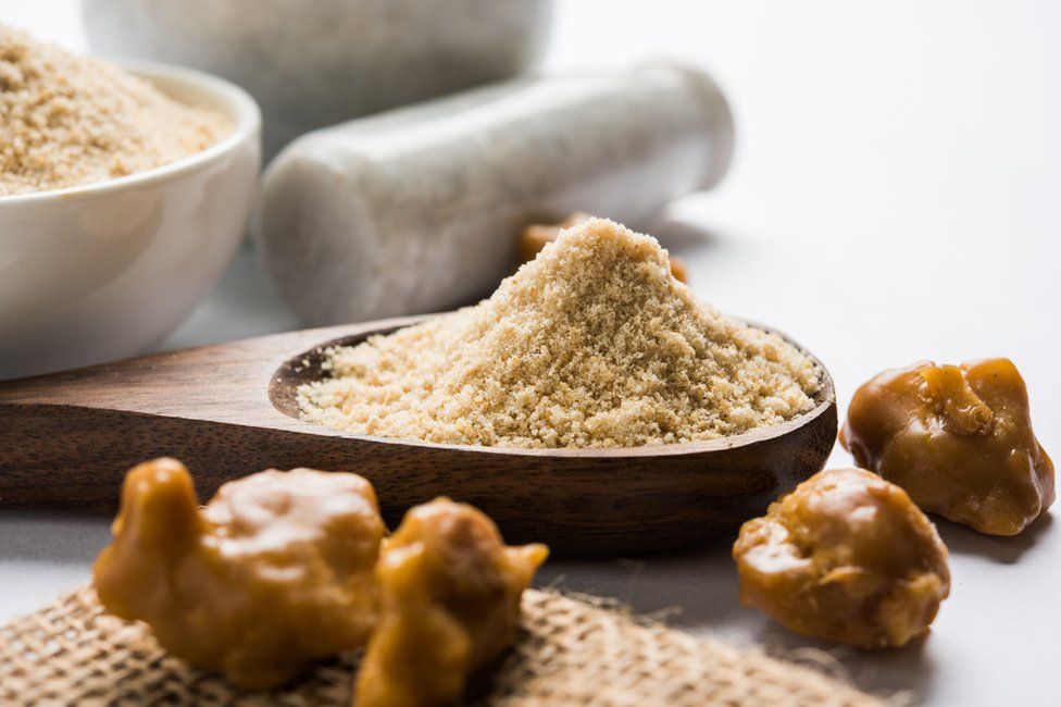 Asafoetida cake and powder or Hing.