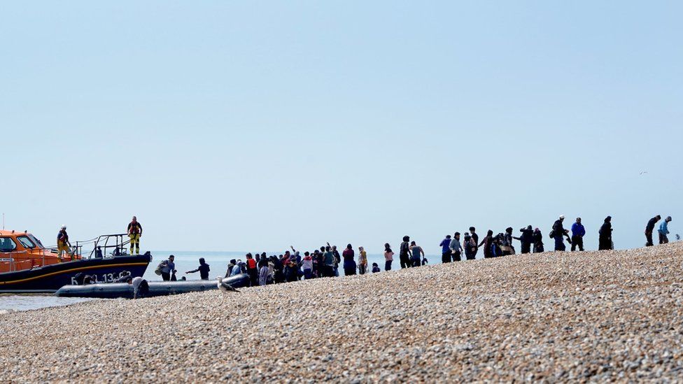 A large group arrives at Dungeness