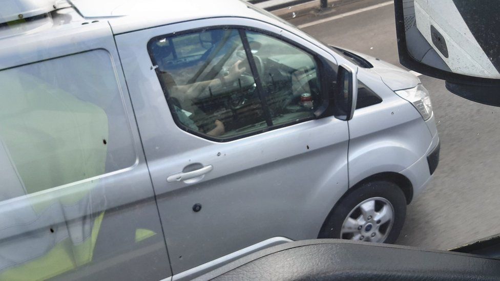Police capture a woman eating cereal at the wheel from an HGV cab