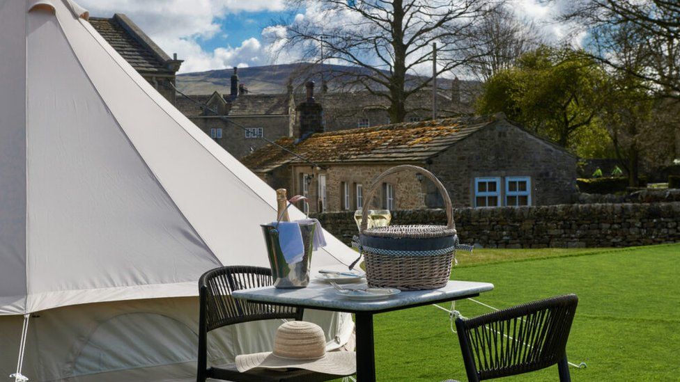 Marble-topped tables sourced from closed Carluccio's branches served as a solution when the hotel was unable to procure the lawn furniture it needed