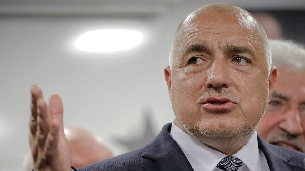 Bulgarian ex-premier Boyko Borisov, leader of the centre-right GERB party, gestures during a statement at the party's headquarters, in Sofia, Bulgaria