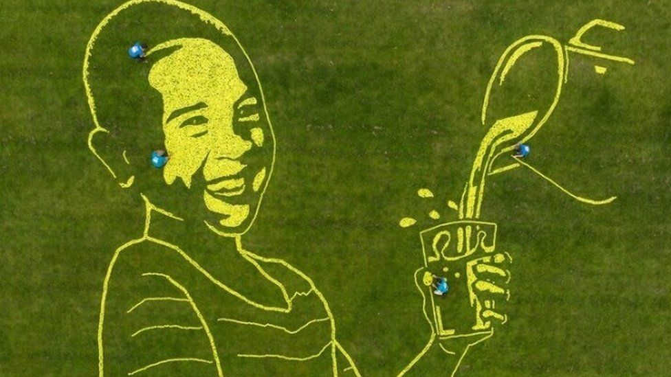 WaterAid Giant mosaic made from tennis balls BBC Newsround