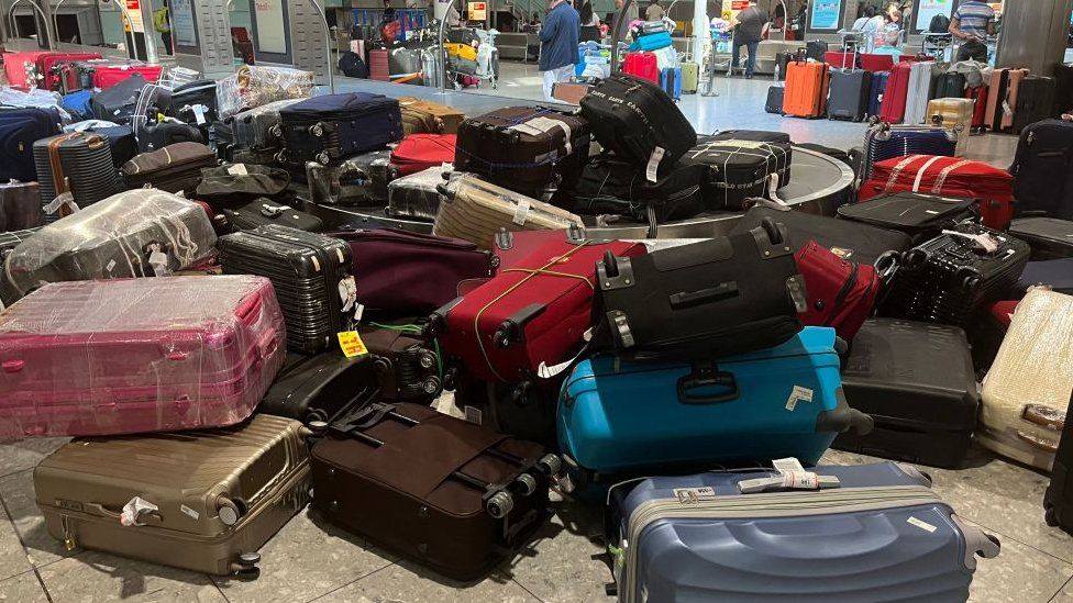 Piles of luggage at Heathrow