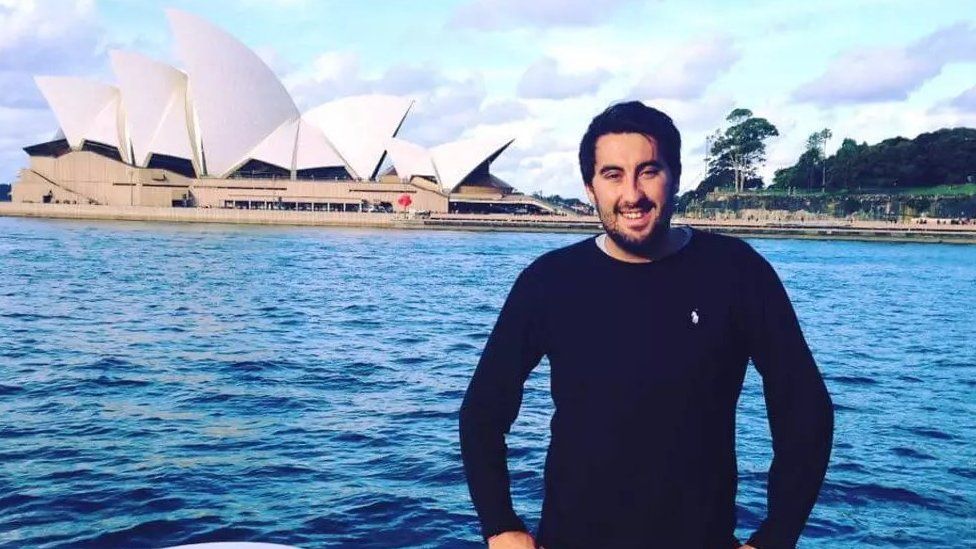 Scott Harry Richardson stands in front of the Sydney Opera House, in an image posted on Facebook