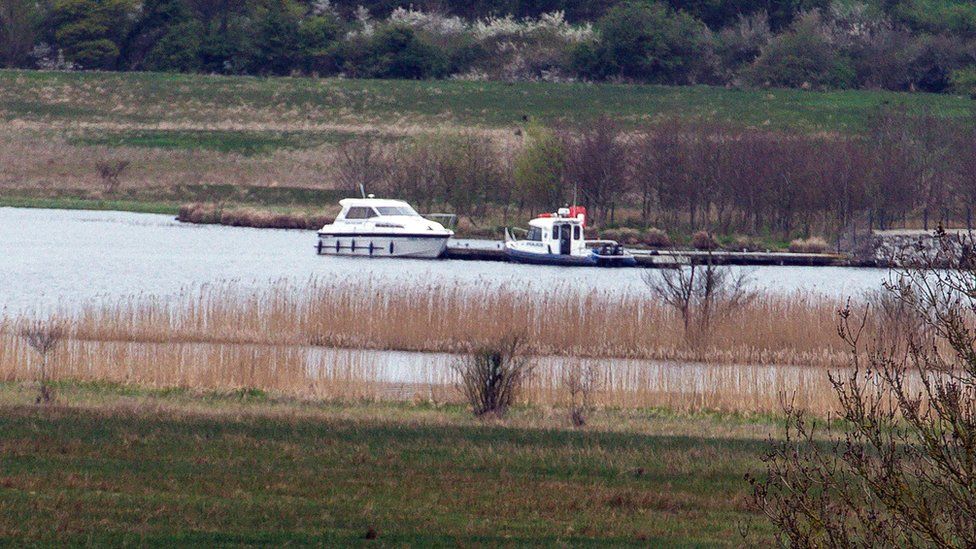 Boat at jetty in Lough Erne