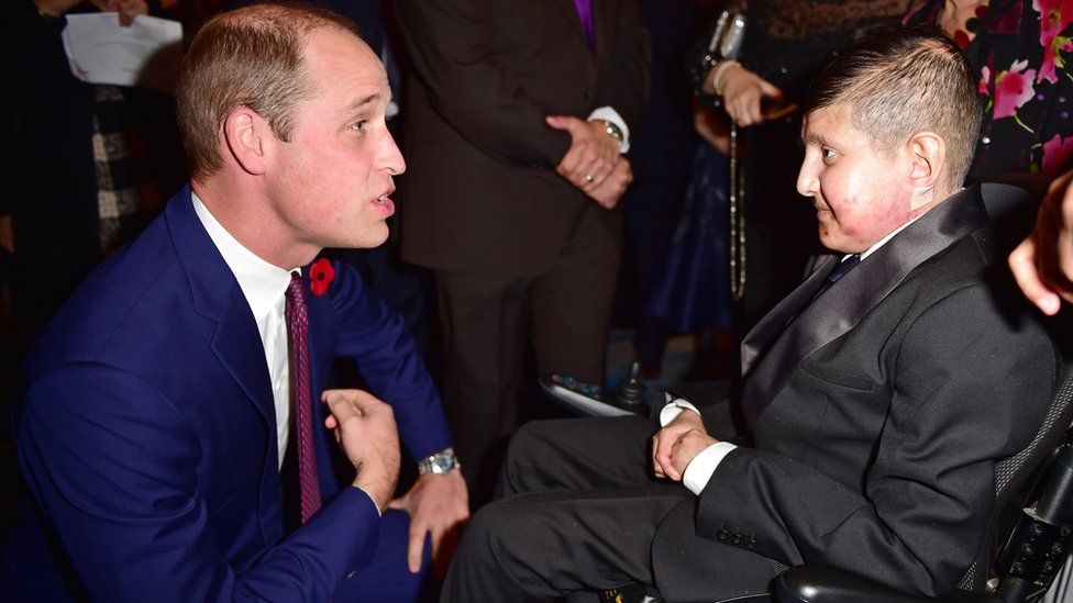 Duke of Cambridge greeting Moin Younis at the Pride of Britain Awards in 2017