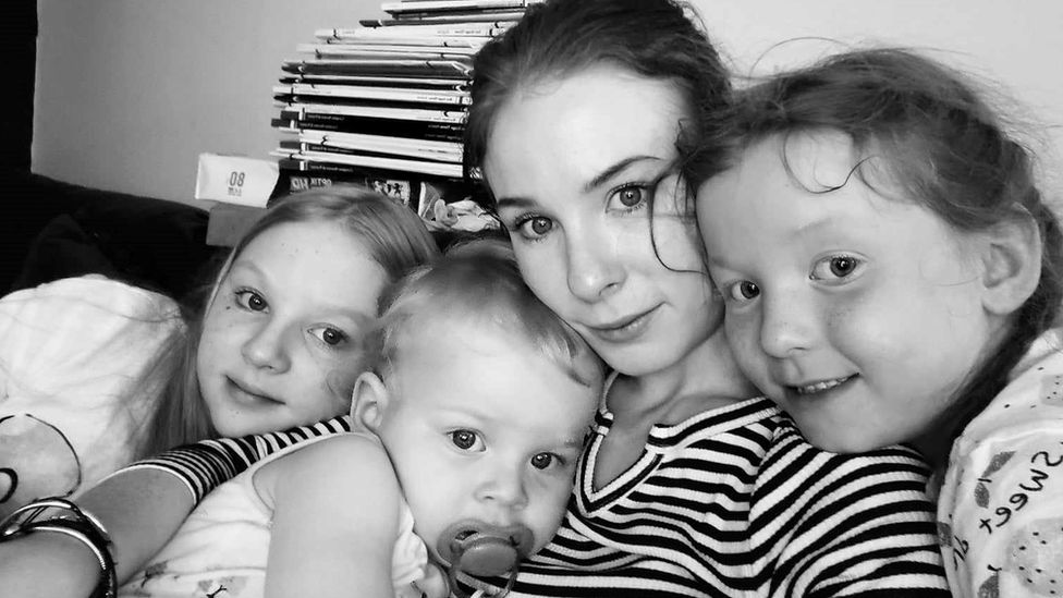 Millie-Rae with her mum Seana-lee and sister Lottie, six, (right) and brother Dominic, one