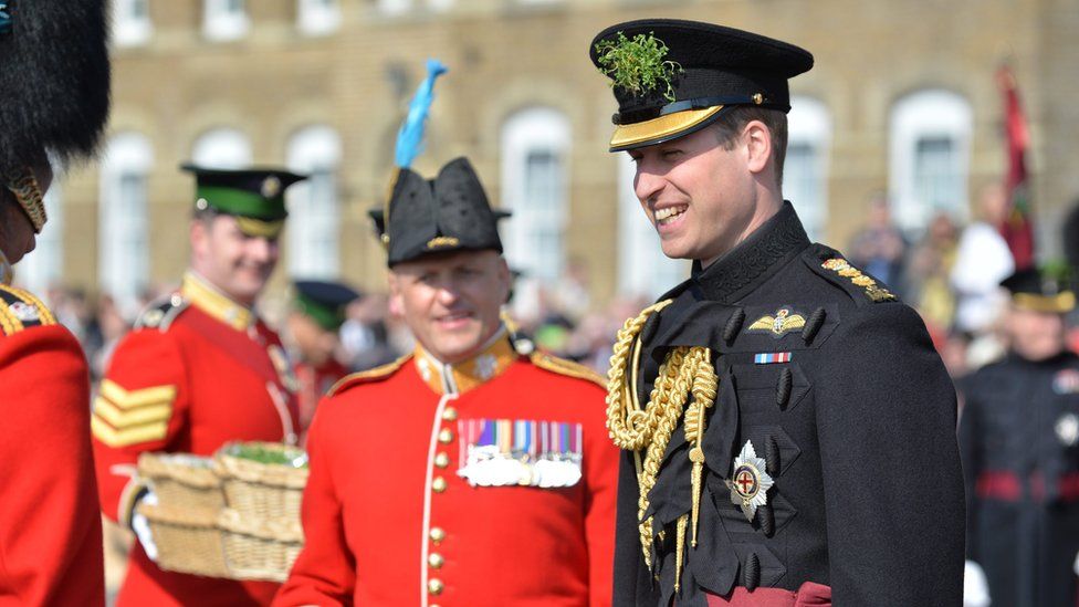 Prince William presents soldiers with St Patrick's Day shamrocks - BBC News