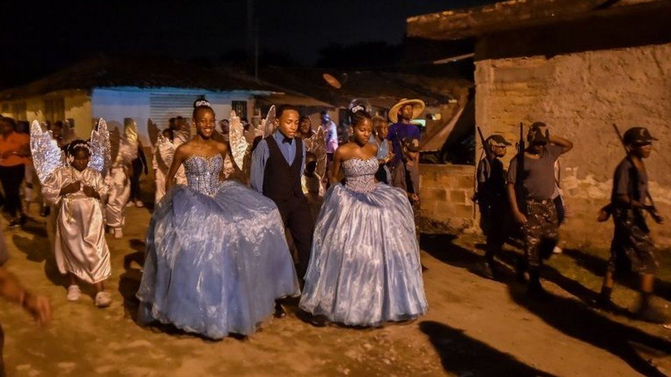 Afro-Colombian children in costumes take part in the "Adoraciones al Nino Dios" celebrations in Quinamayo, department of Valle del Cauca, Colombia, on February 18, 2018.