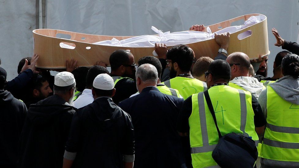 Body of a victim of the mosque attacks arrives during the burial ceremony at the Memorial Park Cemetery in Christchurch, New Zealand March 20, 2019