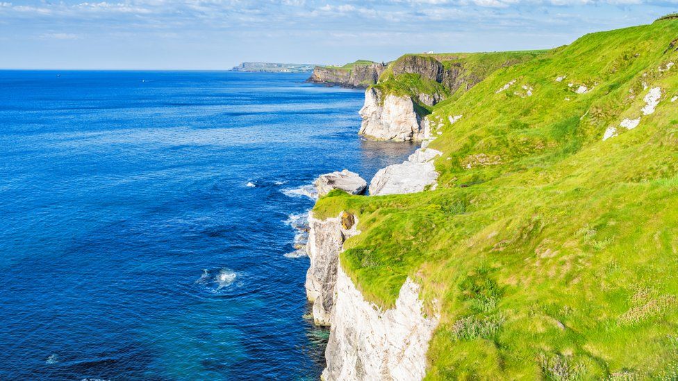 Stock photograph of the cliffs at The Whiterocks near Portrush Northern Ireland UK on sunny day.