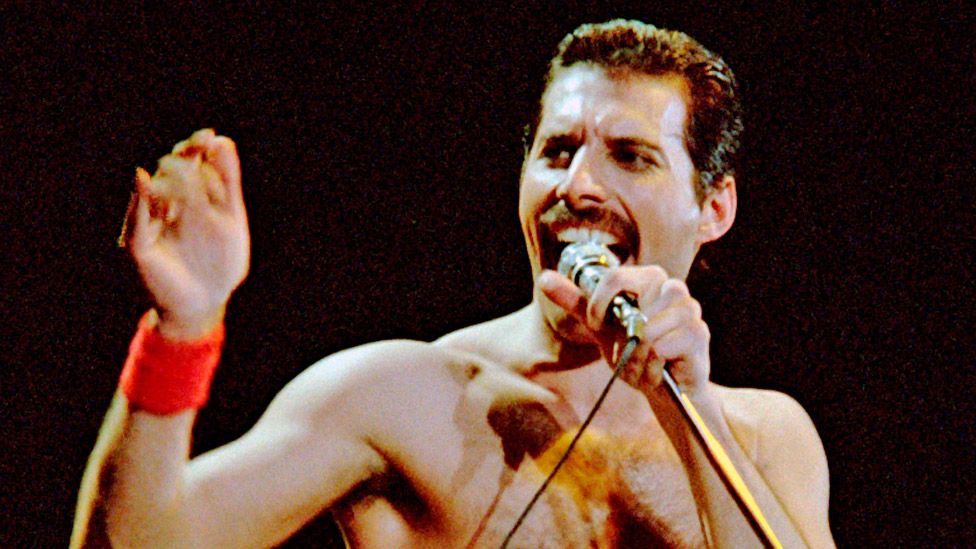 Queen frontman Freddie Mercury on stage