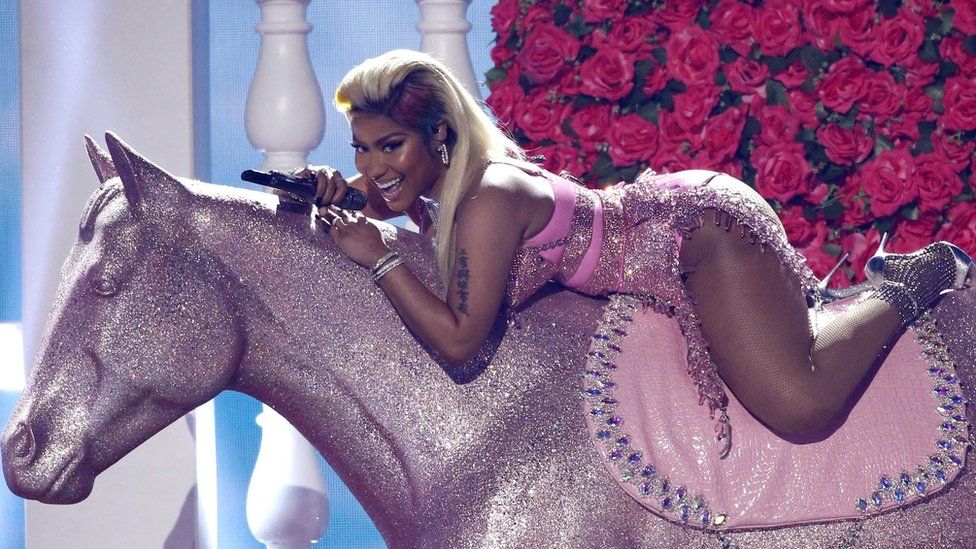 Nicki Minaj on a horse
