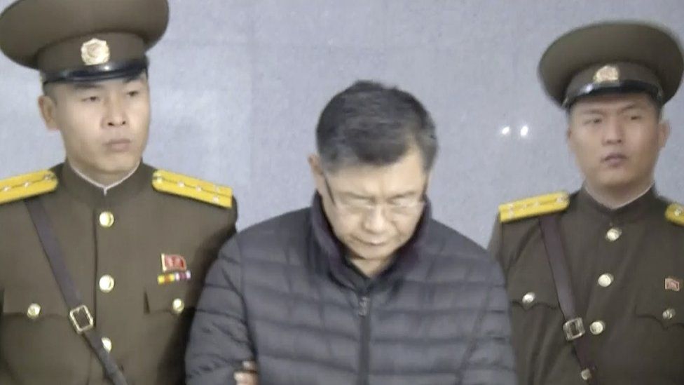Hyeon Soo Lim is escorted into court in Pyongyang, 16 December