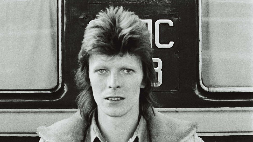 A black and white photo of David Bowie