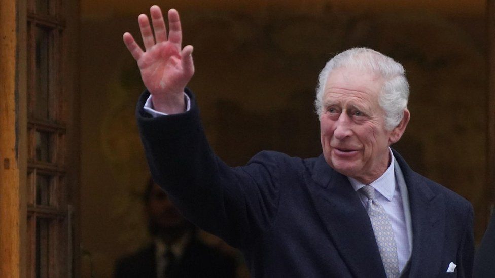 Prince Charles waves to wellwishers outside the London Clinic