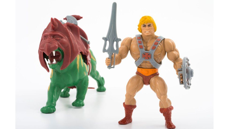Battlecat and He-man figurines