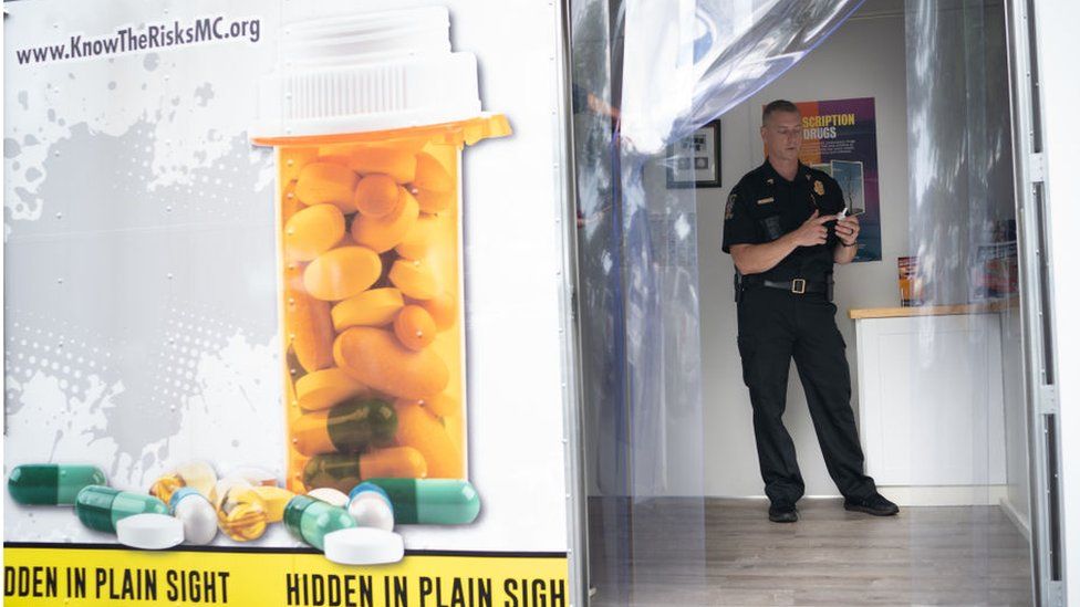 Sgt Peter Johnson talks about the signs of addiction in a Community Opioid Prevention Education trailer in Maryland