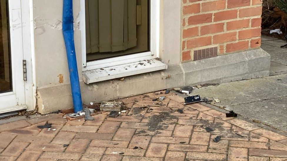 Damage to a police station in Cheltenham