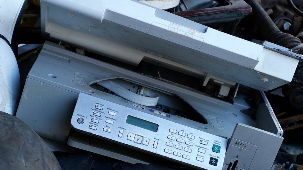 A printer at a landfill