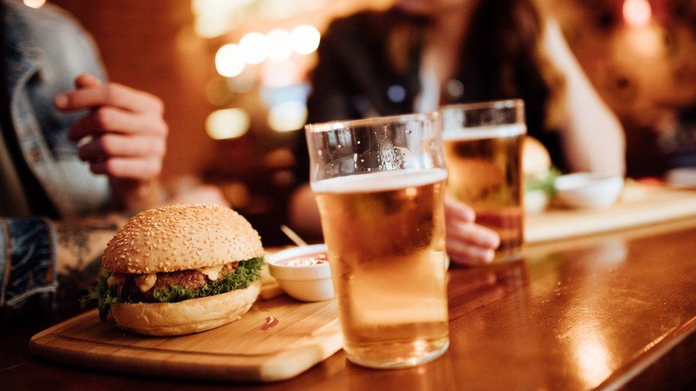A burger and a pint of beer
