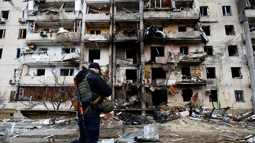 A damaged residential building is seen, after Russia launched a massive military operation against Ukraine, in Kyiv, Ukraine