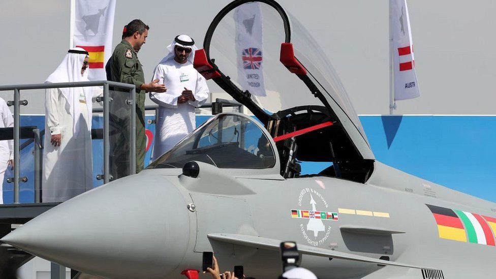 Crown Prince of Dubai, Sheikh Hamdan bin Mohammed bin Rashid al-Maktoum (R), looks at an Eurofighter Typhoon fighter jet during the Dubai Airshow on November 14, 2017, in the United Arab Emirates.