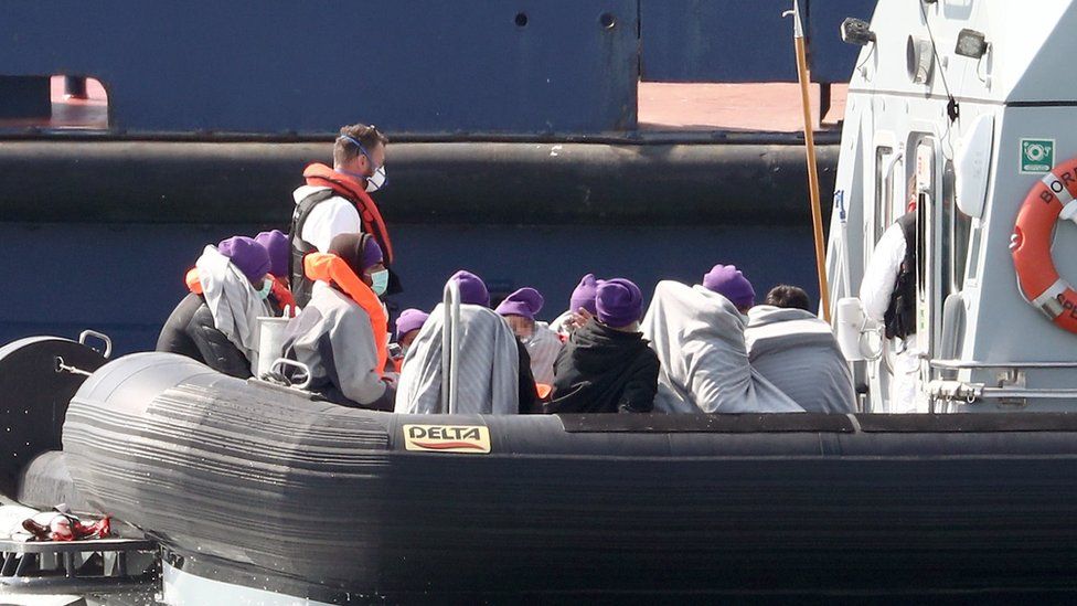 People believed to be migrants are brought to Dover on board a Border Force boat