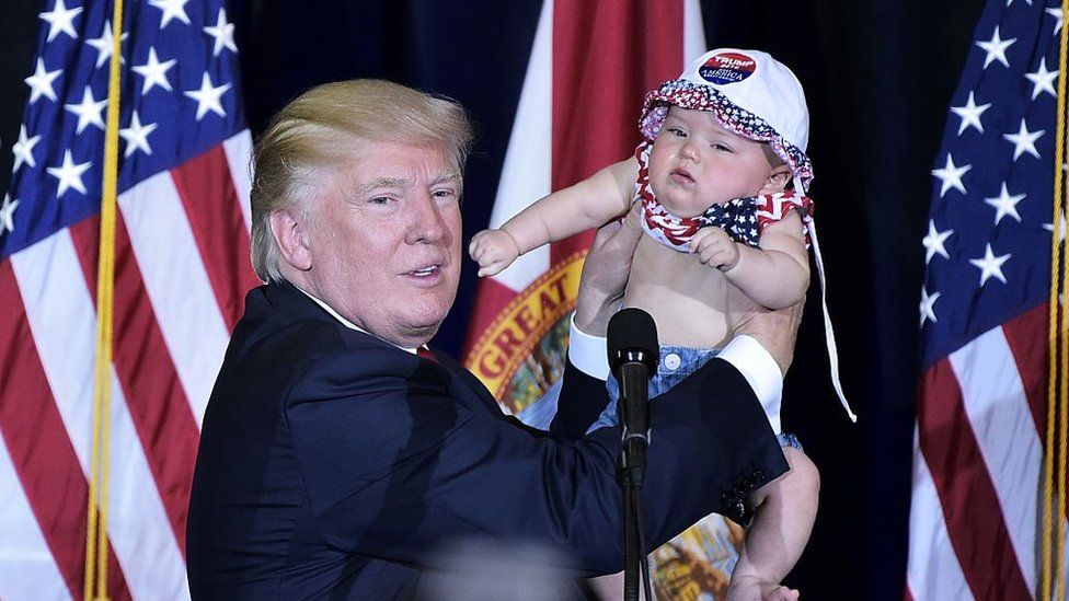 Donald Trump during the campaign, with baby