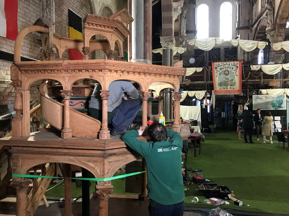 South West College students and staff rebuild the pulpit inside St Joseph's