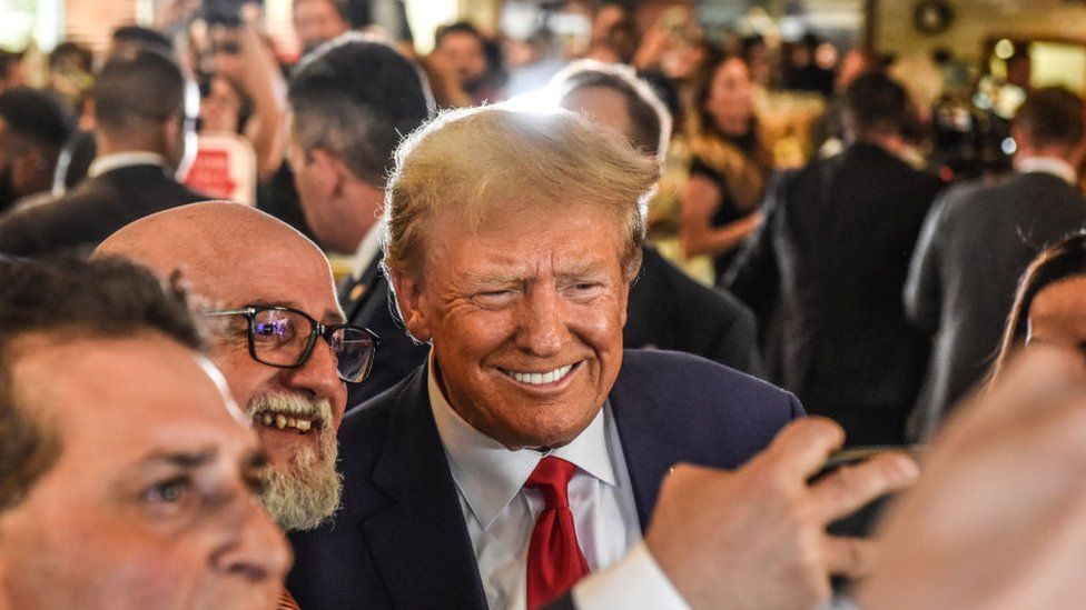 Donald Trump with supporters after being arraigned in Miami, Florida