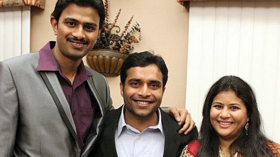 Srinivas Kuchibhotla, left, poses for photo with Alok Madasani and his wife Sunayana Dumala in Cedar Rapids, Iowa.