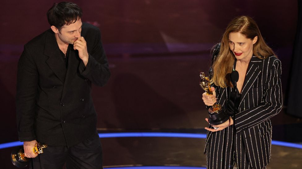 Justine Triet and Arthur Harari win the Oscar for Best Original Screenplay for "Anatomy of a Fall" during the Oscars show at the 96th Academy Awards in Hollywood, Los Angeles, California, U.S., March 10, 2024.