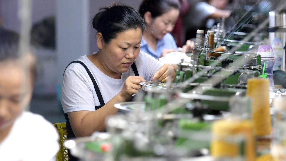 A woman works in a factory in China