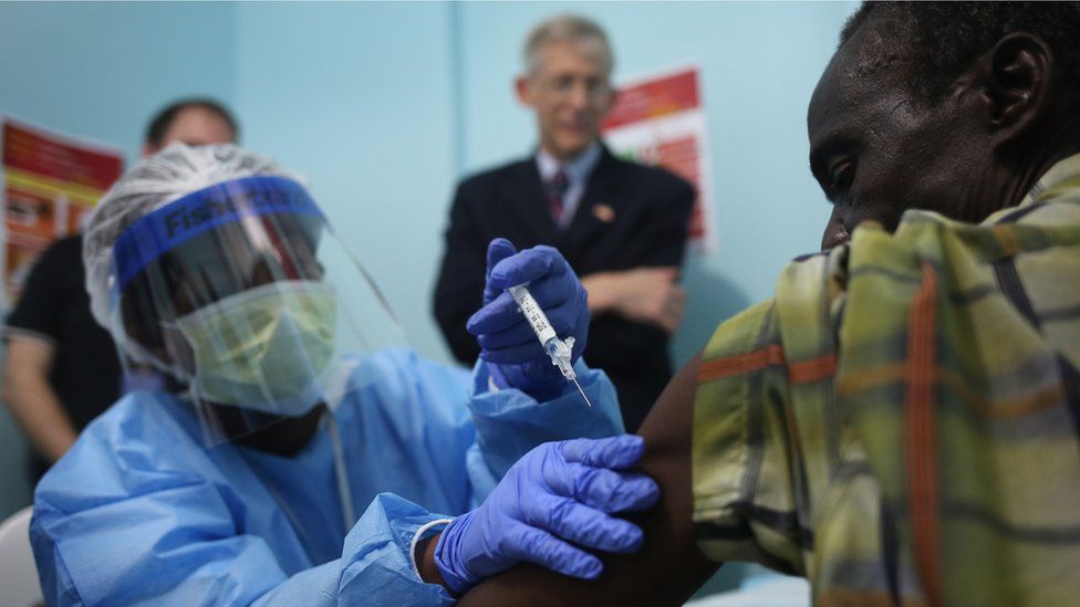 A nurse administers an injection on the first day of the Ebola vaccine study in Monrovia, Liberia, on February 2, 2015 .