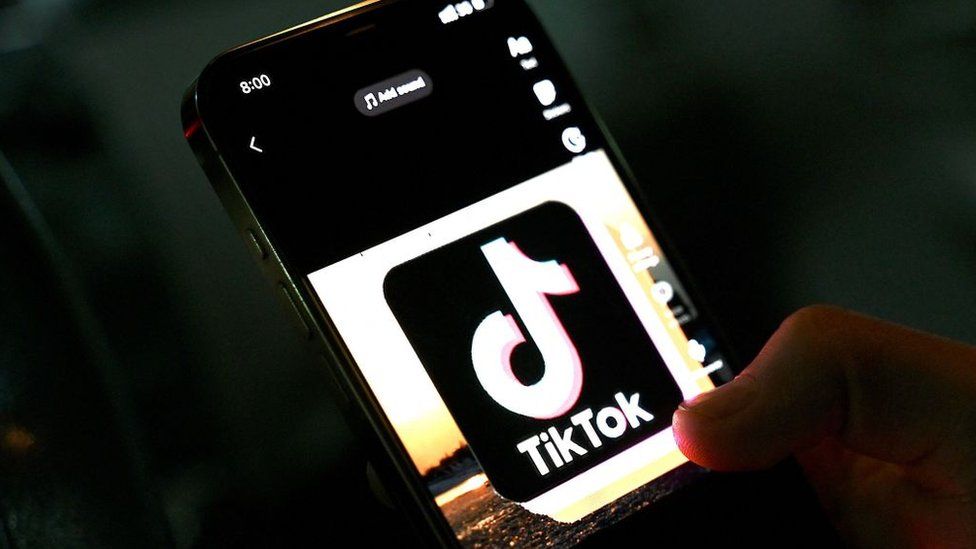 In this photo illustration taken on April 21, 2022, the icon of an video sharing mobile phone application TikTok is pictured on a mobile phone used by an Afghan youth in Kabul.