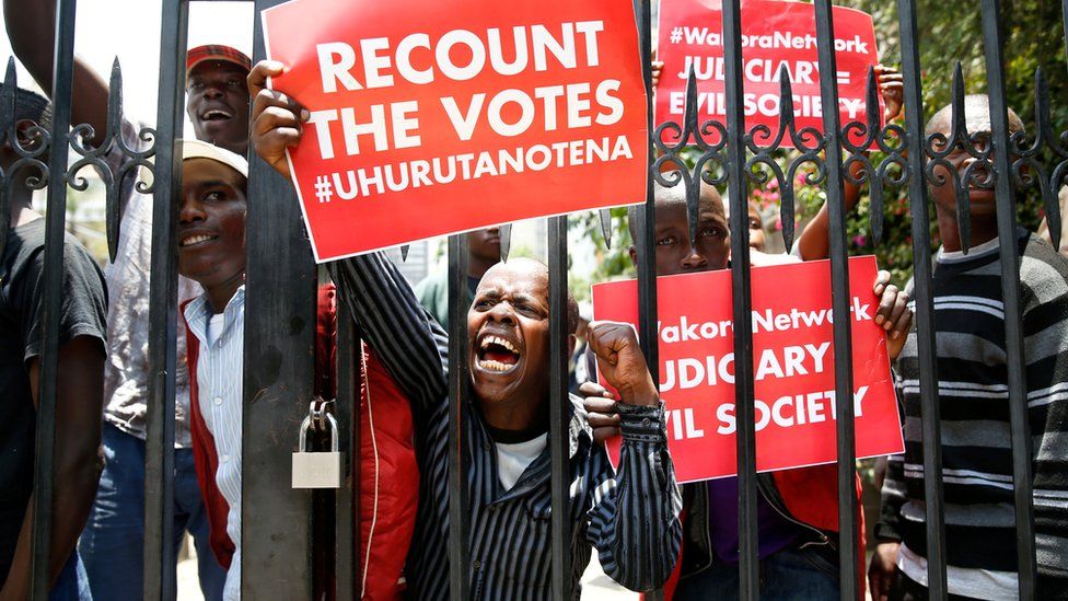 Mr Kenyatta's supporters protest outside the country's Supreme Court, 19 September 2017