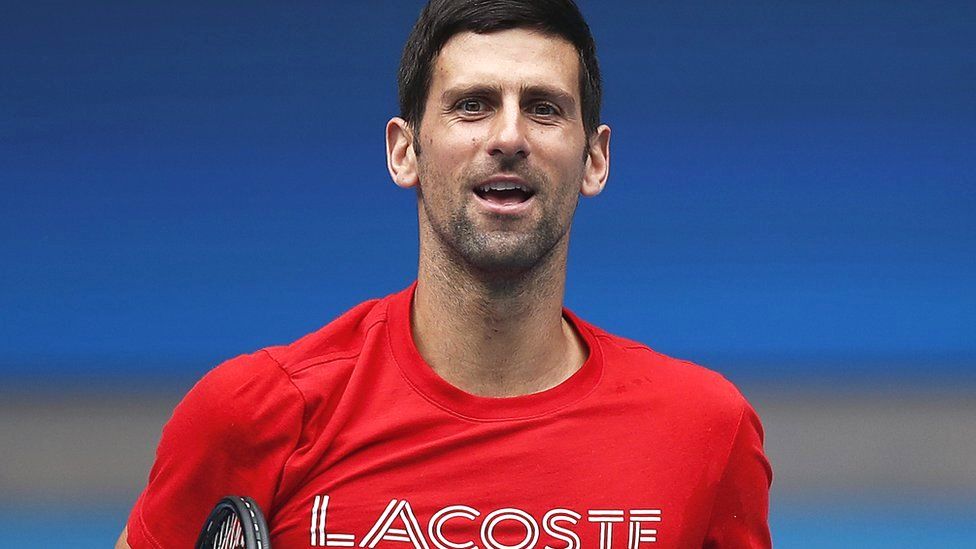 Novak Djokovic of Serbia reacts during a practice session at Melbourne Park on February 1, 2021 in Melbourne, Australia